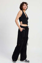 FRENCH TERRY PANTS WITH CUTOUT DETAIL Meadeux