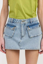 LOW WAIST DENIM MINI SKIRT WITH POCKETS Meadeux